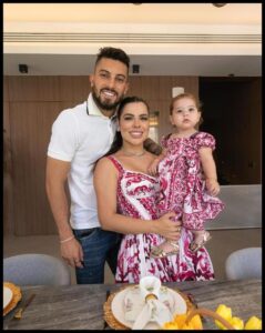 Alex Telles with wife Priscila Minuzzo and Daughter