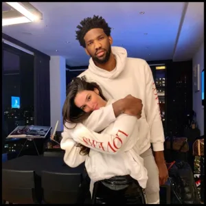 Joel Embiid with his partner Anne de Paula