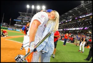 Pete Alonso and Haley Alonso in field