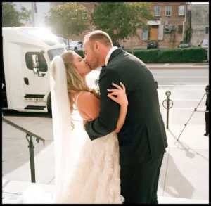 Pete Alonso kissing his wife Haley Alonso